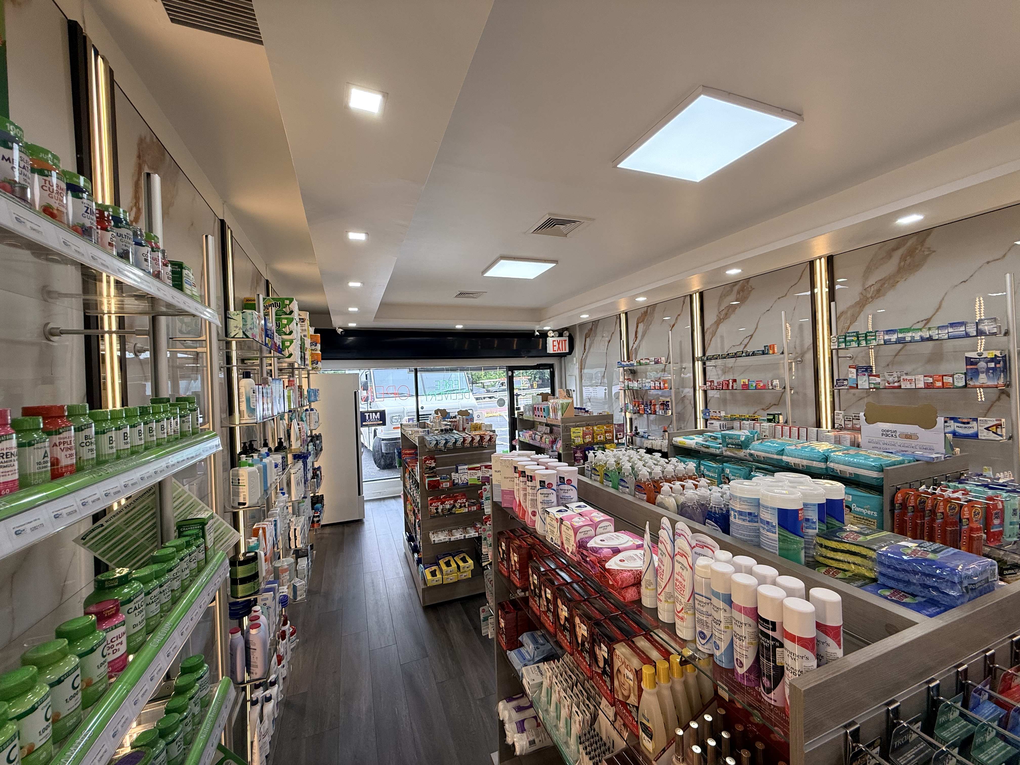 The wellness and personal care aisles inside Procare Pharmacy on Hylan